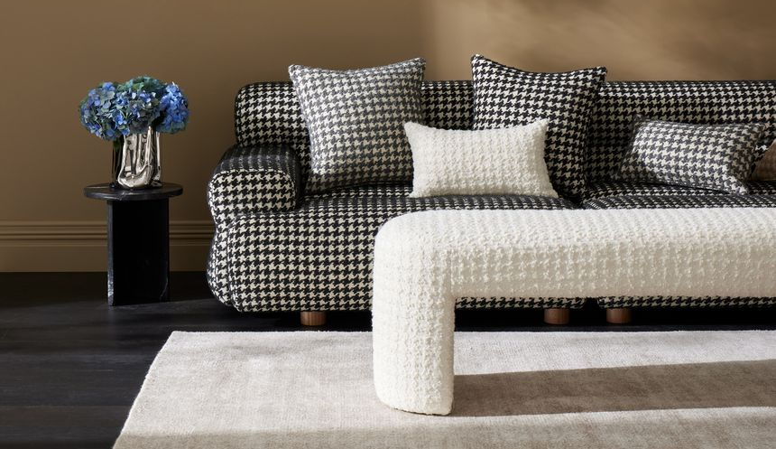 contemporary, textured bouclé with a sophisticated houndstooth pattern
