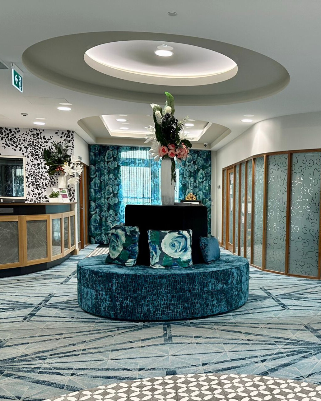 Importance of design in an aged care setting. Custom circle seating in reception area.