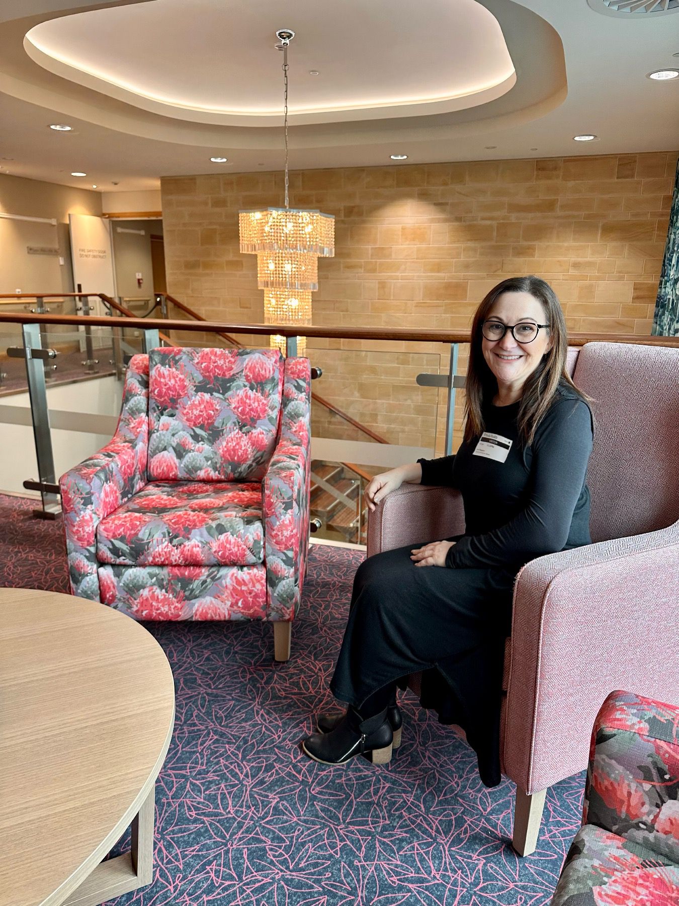 importance of design in an aged care setting. Lisa, our senior design consultant, in custom upholstered chairs.